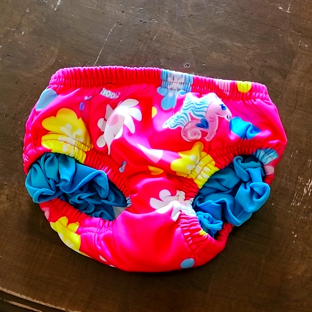 SwimSchool reusable swim diaper, size med, lightly used, like new